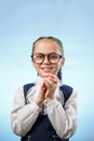 Cute Schoolgirl In Glasses Smile Implore Gesture