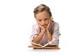 cute schoolkid reading book on white.