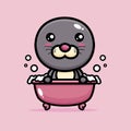 The cute seal animal cartoon character is bathing in a pink bath