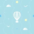 Cute seamless background with hot air balloon, stars, clouds and flying birds. Blue pattern with dotted stripes.