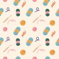 Cute seamless background with wool and knitting tools on it. Concept of handmade workshop. Pattern, backdrop, texture for wrapping Royalty Free Stock Photo