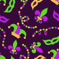 Cute seamless Mardi Gras background with masks and beads in traditional colors Royalty Free Stock Photo