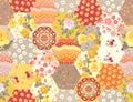 Cute seamless patchwork pattern with flowers and polka dot ornaments in warm yellow colors Royalty Free Stock Photo