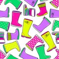 Cute seamless pattern with bright hand drawn rubber boots