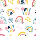 Cute seamless pattern with children`s rainbows,