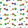 Cute seamless pattern consisting of colorful children s truck toys in red blue green and orange colors. Vector. Royalty Free Stock Photo