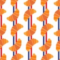 Cute seamless pattern with croissants and colors of french flag stripes.