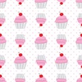 Seamless pattern with pink cupcakes and cherries on polka dots background Royalty Free Stock Photo