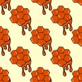 Cute seamless pattern with drops of honey and honeycombs. Hand drawn stock illustration Royalty Free Stock Photo
