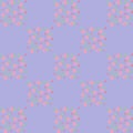 Cute seamless pattern of pink flowers on the blue background Royalty Free Stock Photo