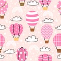 Cute seamless pattern with pink hot air balloons in sky. Childish print with clouds and rainbows. Cartoon dream
