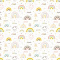 Cute seamless pattern with rainbows. Hand drawn nursery design elements. Trendy baby texture for fabric, textile, cloth, wrapping Royalty Free Stock Photo