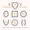 Cute set of black insignia leaves emblems icons in different shapes