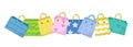 Cute shopping bag banner. Colorful shopping bags with different design board. Paper bags with space for text. Gift