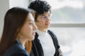 Cute and short hair businesswoman wearing eyesglasses in office