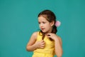 Cute shy little child girl in yellow dress Royalty Free Stock Photo