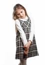 Cute shy schoolgirl against isolated background Royalty Free Stock Photo