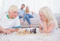 Cute siblings playing chess Royalty Free Stock Photo