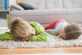 Cute silblings lying on the rug Royalty Free Stock Photo