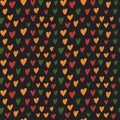 Cute simple Kwanzaa, Black History Month, Juneteenth seamless pattern with hand drawn hearts in traditional African colors - red