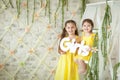 Cute little girls in spring studio