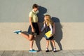 Cute sisters schoolgirl in school uniform.