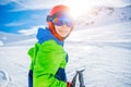 Cute skier boy in a winter ski resort. Royalty Free Stock Photo