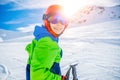 Cute skier boy in a winter ski resort. Royalty Free Stock Photo