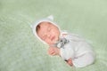 Cute sleeping newborn baby with kitten hat Royalty Free Stock Photo