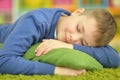 Cute sleeping teenage boy close-up