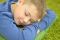 Cute sleeping teenage boy close-up