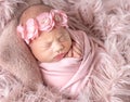 Cute sleepy newborn baby