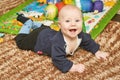 Cute small boy lying at bed. Childhood concept Royalty Free Stock Photo