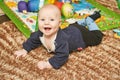 Cute small boy lying at bed. Childhood concept Royalty Free Stock Photo