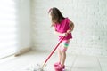 Cute Small Female Cleaning Her House Royalty Free Stock Photo