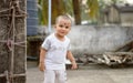 Cute smart naughty baby making a funny and looking at camera. Happy baby background Royalty Free Stock Photo