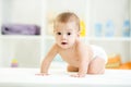 Cute smiling baby in diaper or nappy Royalty Free Stock Photo