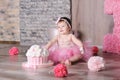 Cute smiling baby girl in pink dress Royalty Free Stock Photo