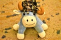 A cute smiling blue stuffed toy cow doll