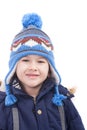 Cute smiling boy with winter clothes, isolated Royalty Free Stock Photo