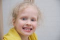 cute smiling girl demonstrates fallen milk tooth Royalty Free Stock Photo