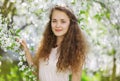 Cute smiling girl outdoors, sunny spring portrait Royalty Free Stock Photo