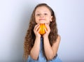 Cute smiling happy kid girl with curly hair style holding the ci Royalty Free Stock Photo