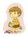 Cute smiling little boy making plasticine figures