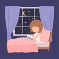 Cute Smiling Little Girl Reading a Book in the Bed at Night in Front of the Window Vector Illustration Royalty Free Stock Photo