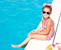 Cute smiling little girl in swimming pool Royalty Free Stock Photo