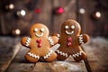 Cute smiling tasty homemade gingerbread men. Delicious cookies on a wooden table Royalty Free Stock Photo
