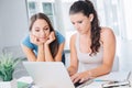 Teen girls studying with a laptop Royalty Free Stock Photo