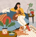 Cute smiling young girl sitting on comfy sofa with dogs and cat. Adorable woman spending time at home with her domestic