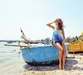 Cute smiling young real woman in asian port, vietnam traveller Royalty Free Stock Photo